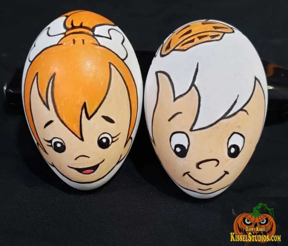 Two hand drawn Easter Eggs featuring Pebbles and Bamm-Bamm.