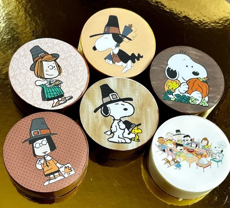 These Thanksgiving themed chocolate covered Oreos feature Snoopy, Woodstock, Peppermint Patty & Marcie.