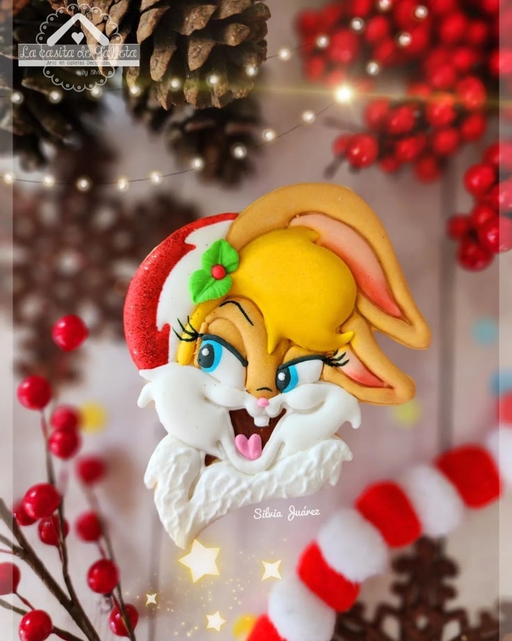 Lola Bunny is wearing a Santa hat and a sprig of Holly